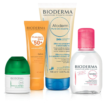 BIODERMA  cestovní balení Photoderm  SPF 50+ krém + šampon  + micerální voda + sprchový olej